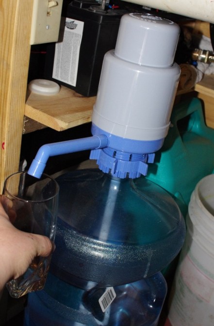 brandy new water jug under the sink