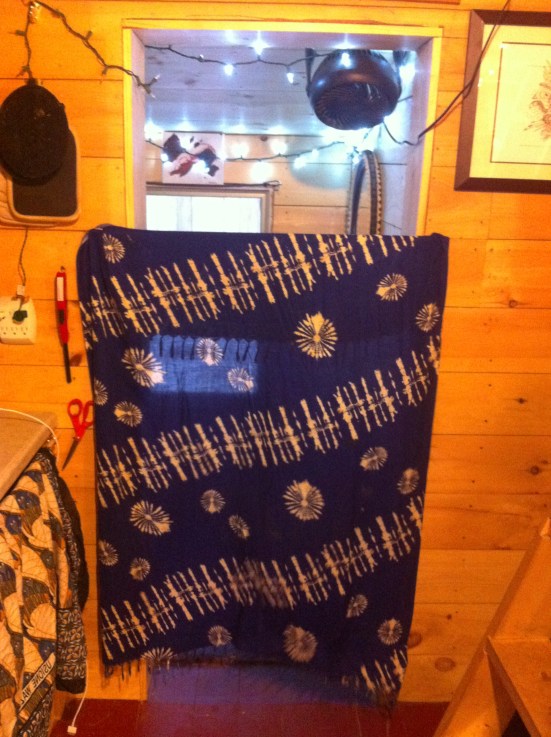 I hung a curtain across the door way that can be easily slid over to store along the wall in my new ski closet